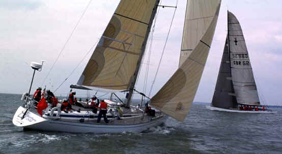 Northern Child with GBR 1 Americas cup yacht in the Solent